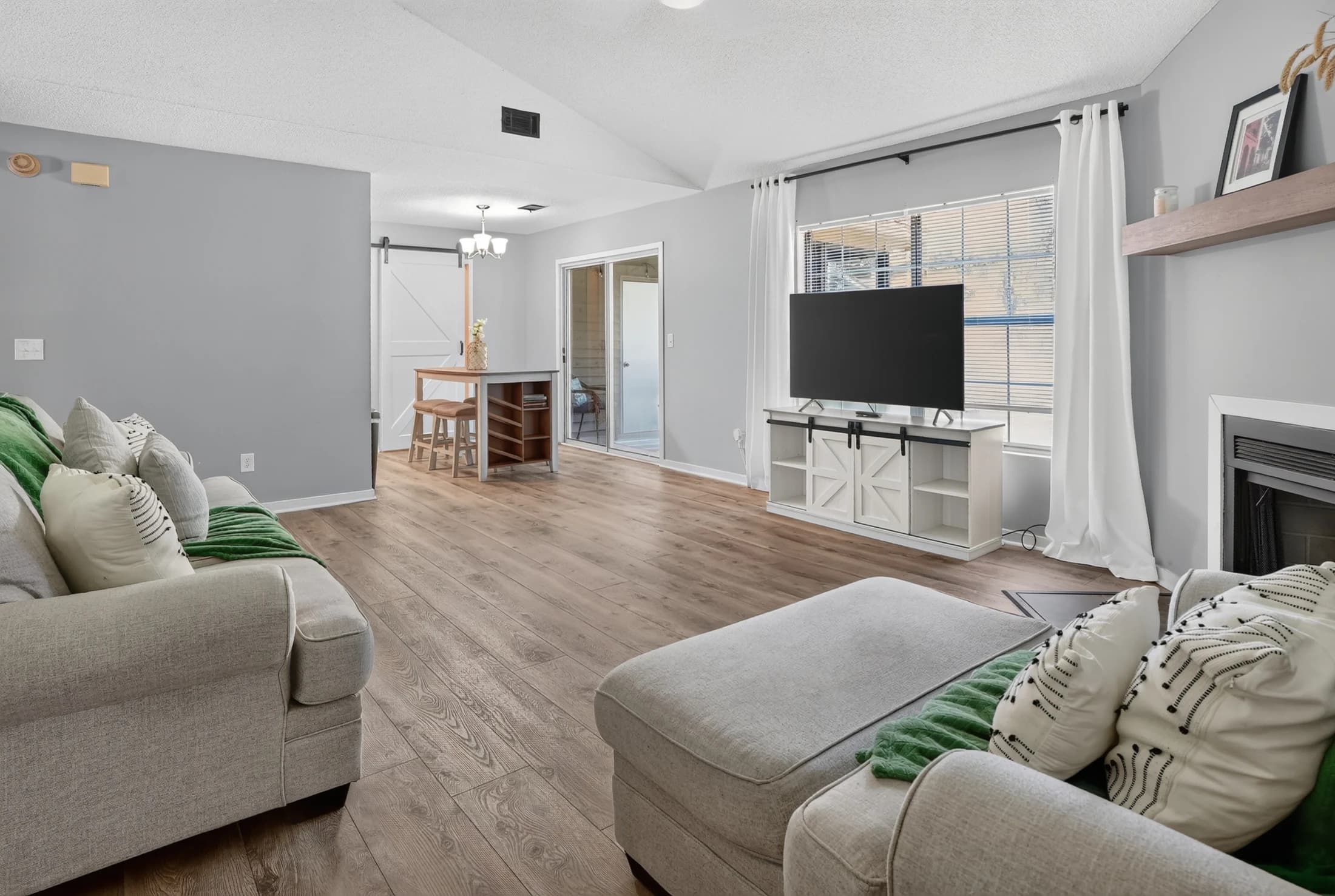 Open living room and dining area at 6231 Rolling Fork Road Unit F